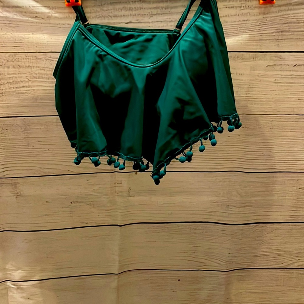 Brand new women’s dark green bathing suit top with Pom poms on the bottom